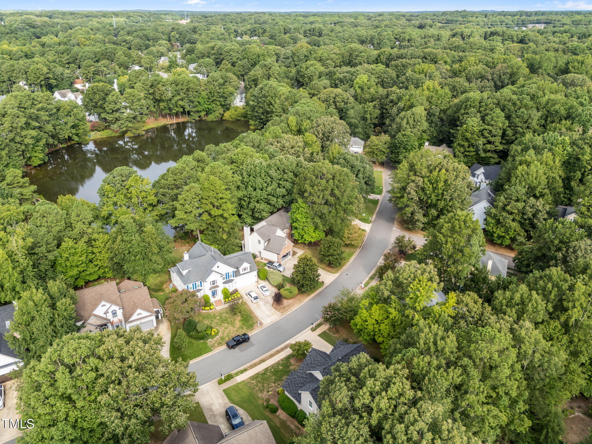 8516 Wheeling Drive Raleigh, NC 27615 - Photo 25 of 29 an aerial view of a house with a yard