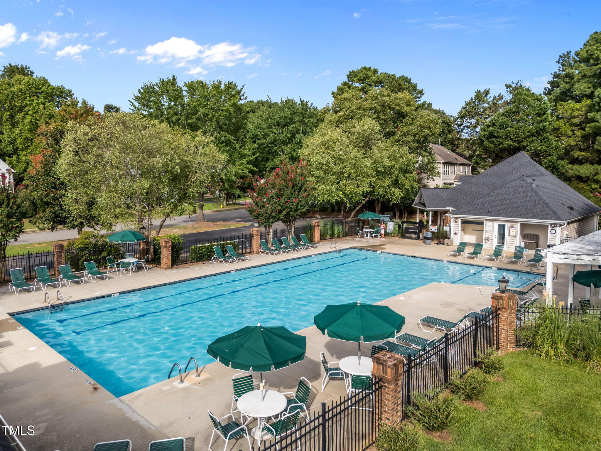 8516 Wheeling Drive Raleigh, NC 27615 - Photo 27 of 29 a view of a house with backyard and sitting area