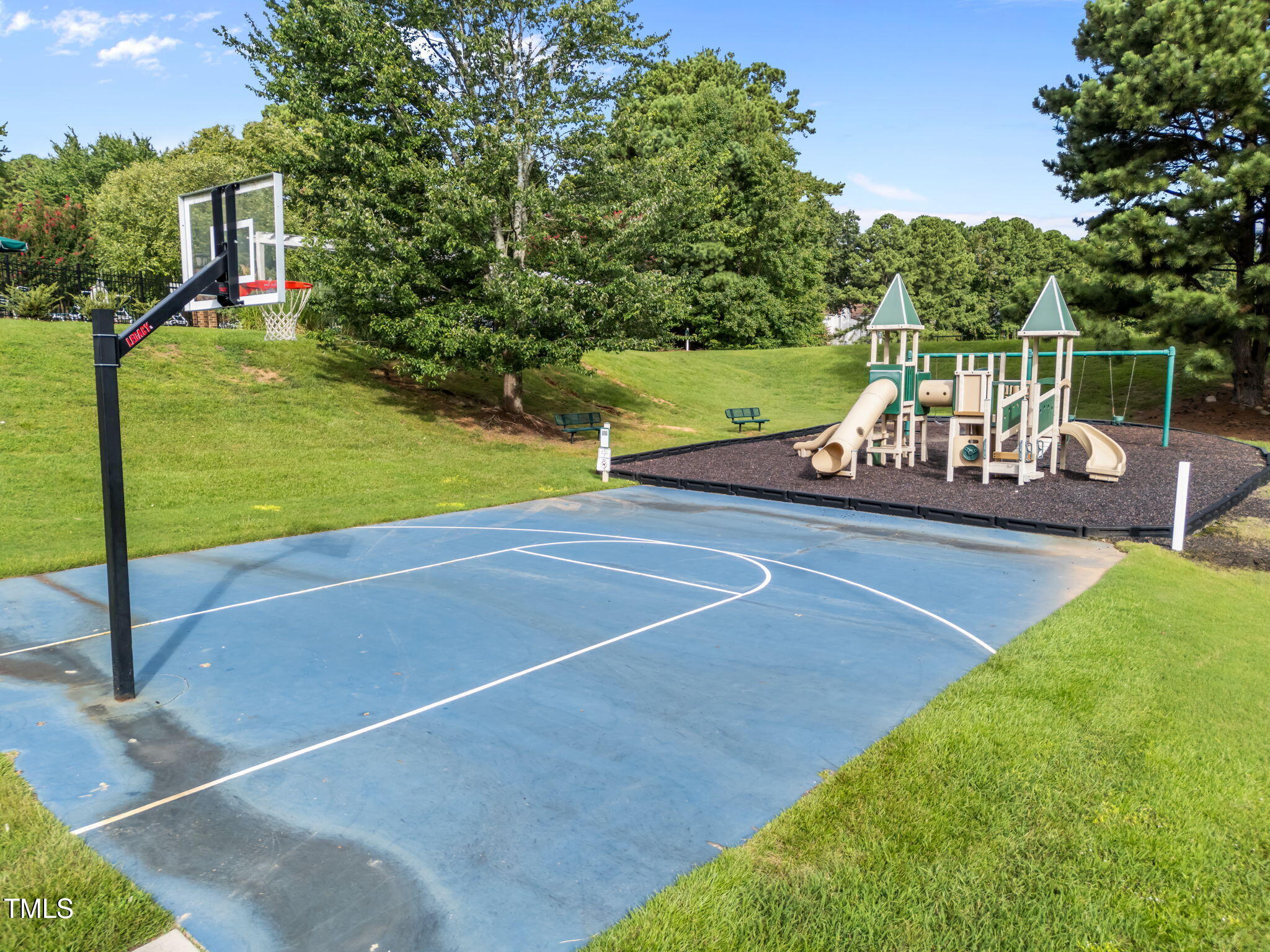 8516 Wheeling Drive Raleigh, NC 27615 - Photo 28 of 29 a view of a house with a yard