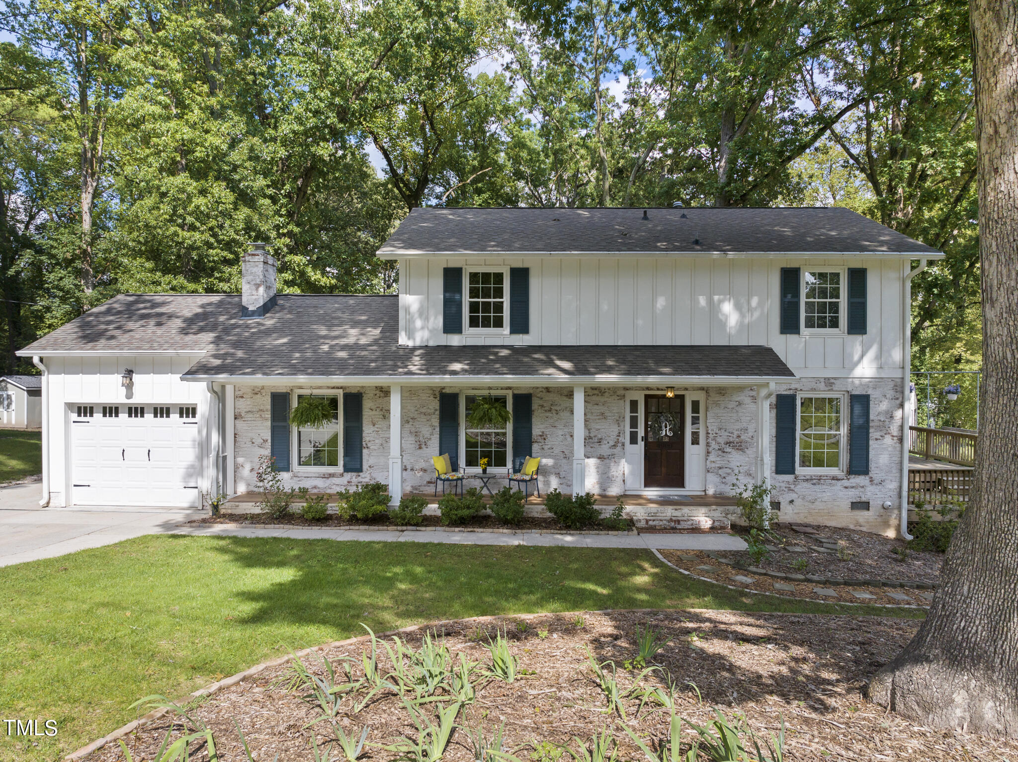 4900 Latimer Road Raleigh, NC 27609 - Photo 1 of 46 front view of a house with a yard