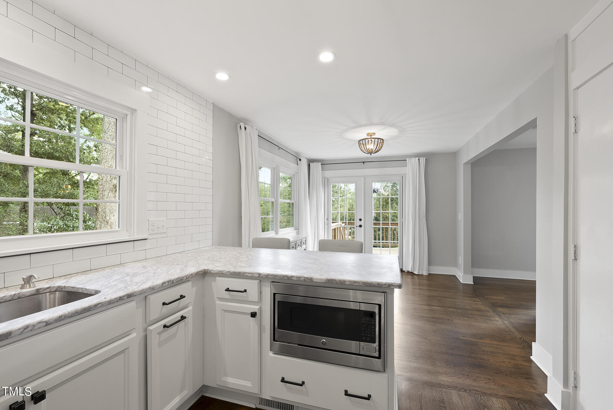 4900 Latimer Road Raleigh, NC 27609 - Photo 17 of 46 a kitchen with a stove and a sink
