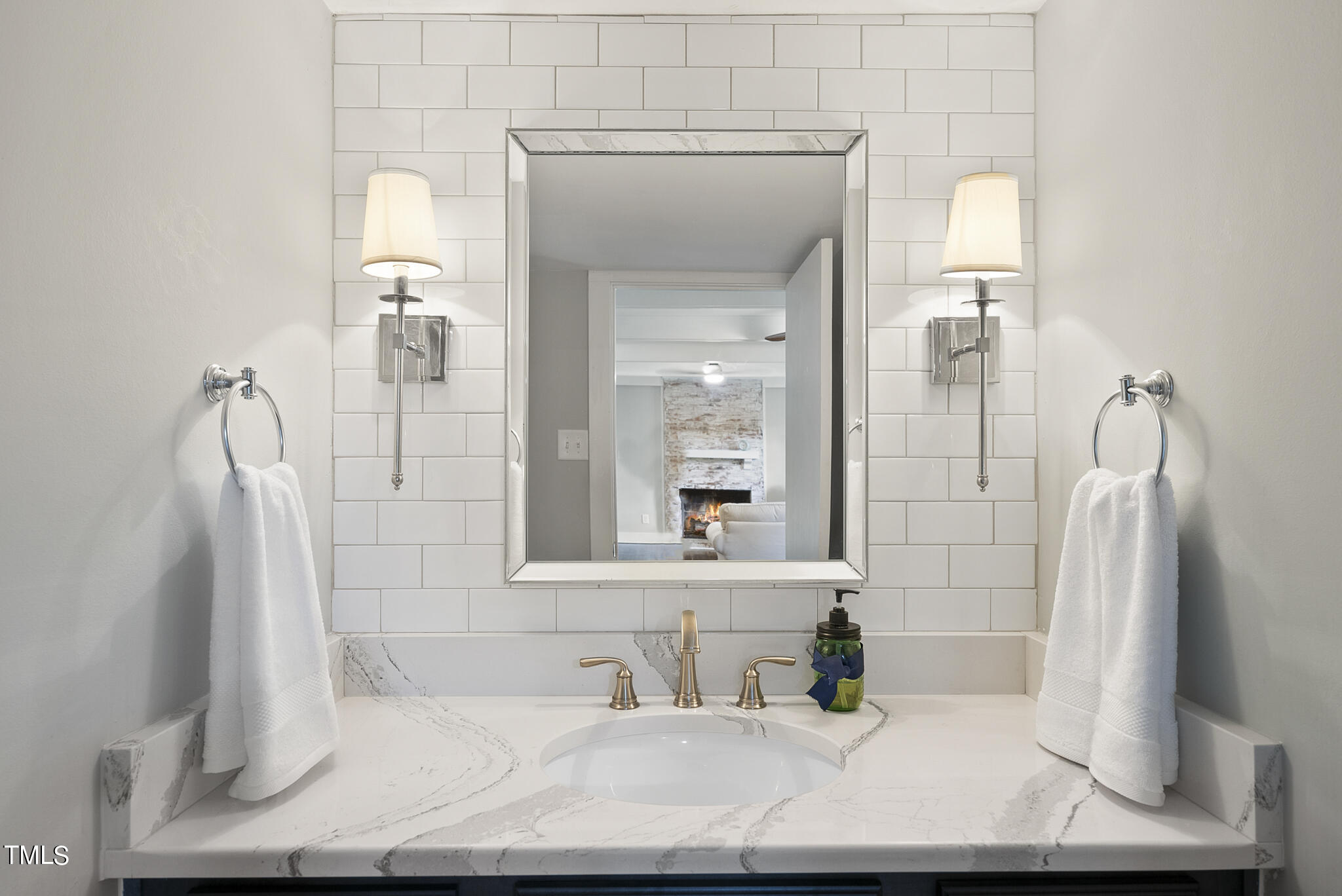 4900 Latimer Road Raleigh, NC 27609 - Photo 22 of 46 a bathroom with a sink and a mirror