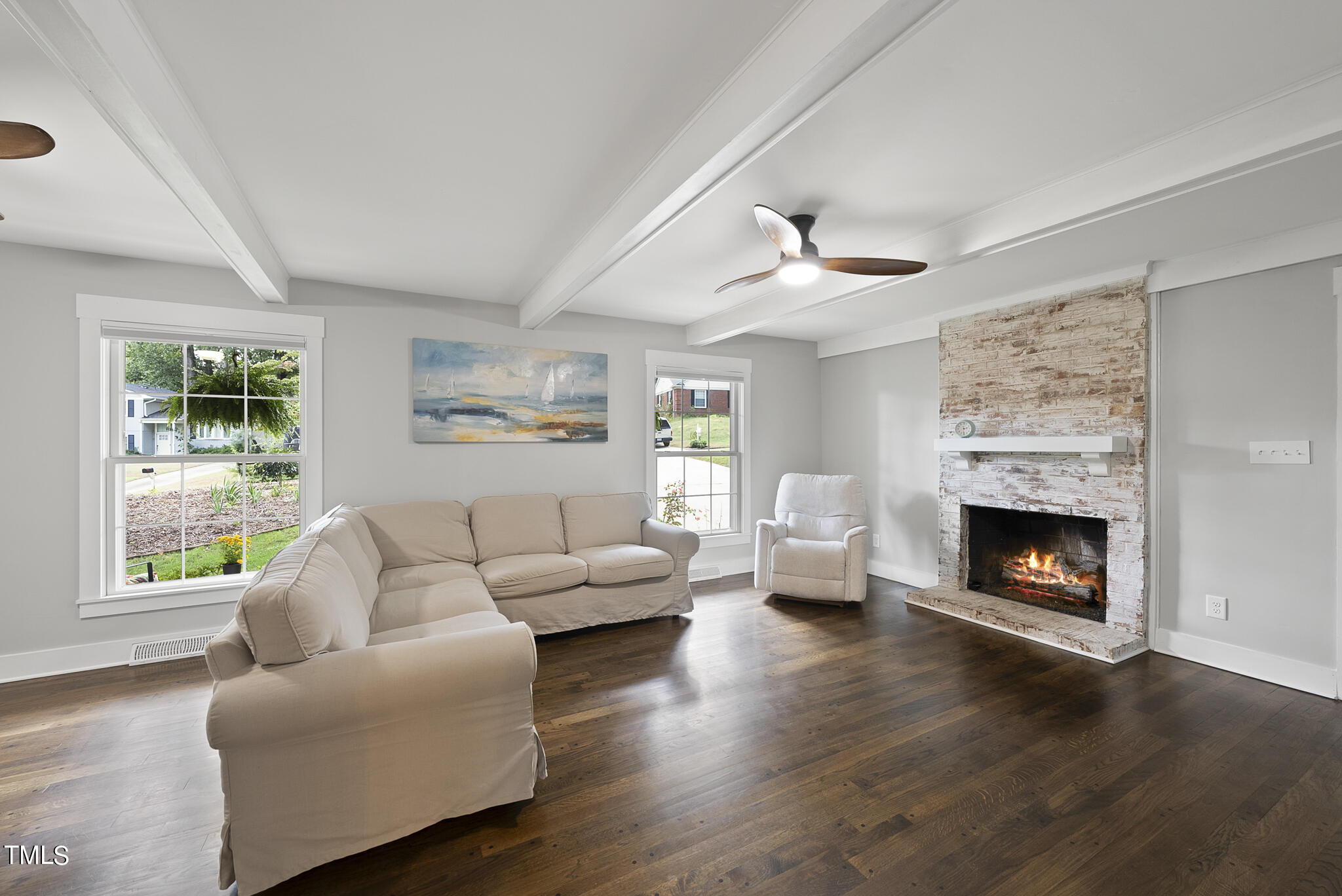 4900 Latimer Road Raleigh, NC 27609 - Photo 25 of 46 a living room with furniture and a fireplace