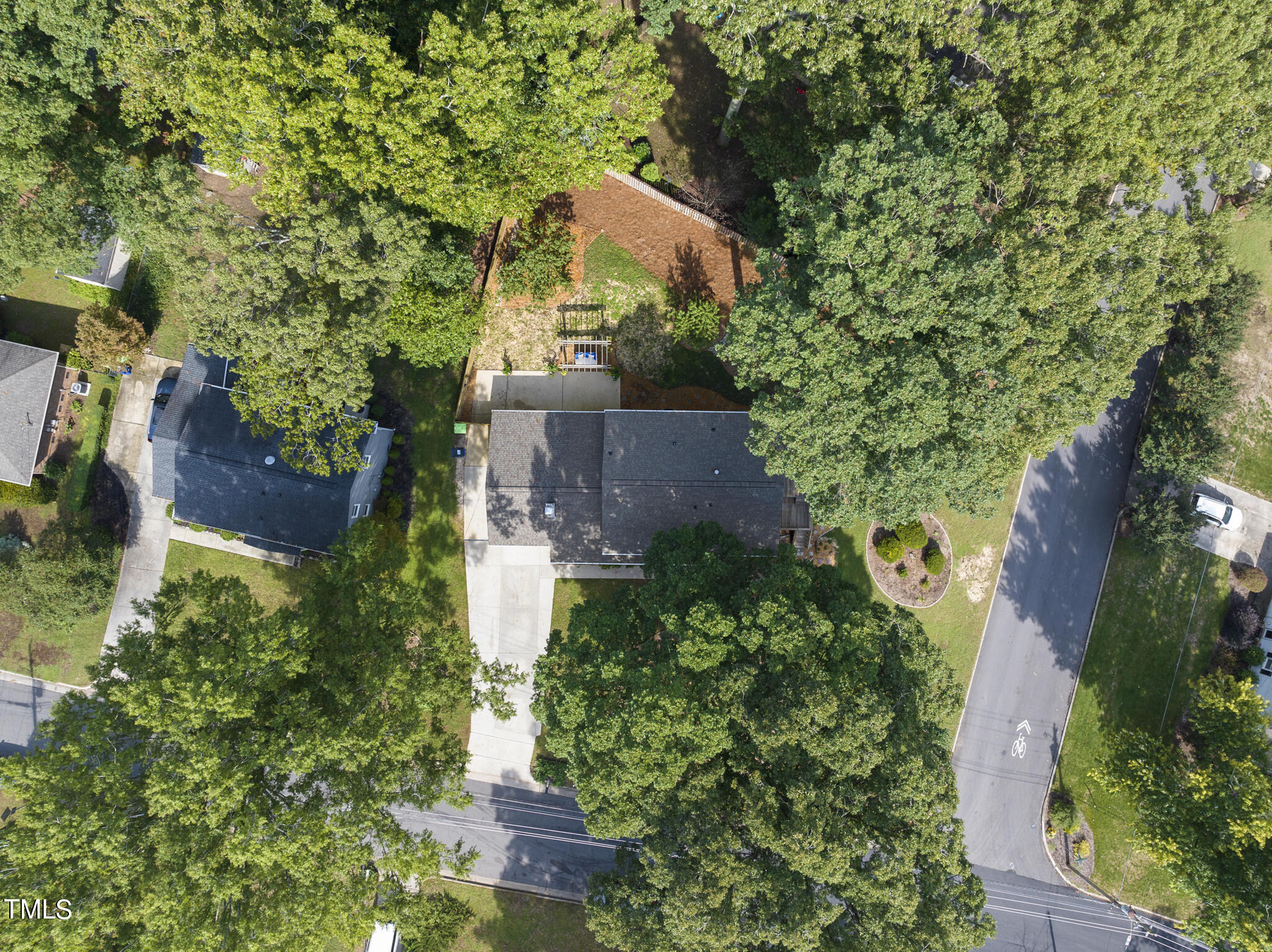 4900 Latimer Road Raleigh, NC 27609 - Photo 45 of 46 an aerial view of a house with a yard