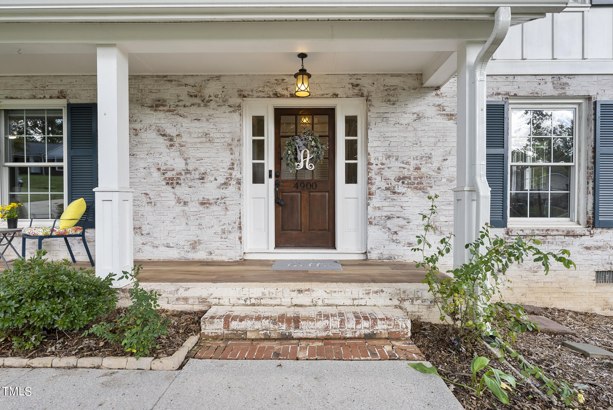 4900 Latimer Road Raleigh, NC 27609 - Photo 10 of 46 front view of a building with potted plants