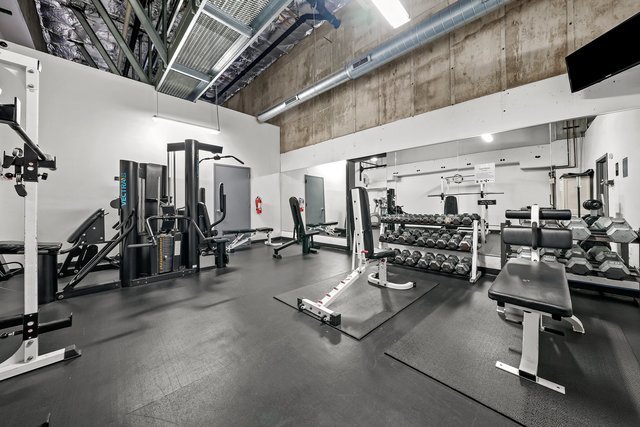 1212 North LaSalle Drive, Unit 1603 Chicago, IL 60610 - Photo 12 of 14 a view of a room with gym equipment
