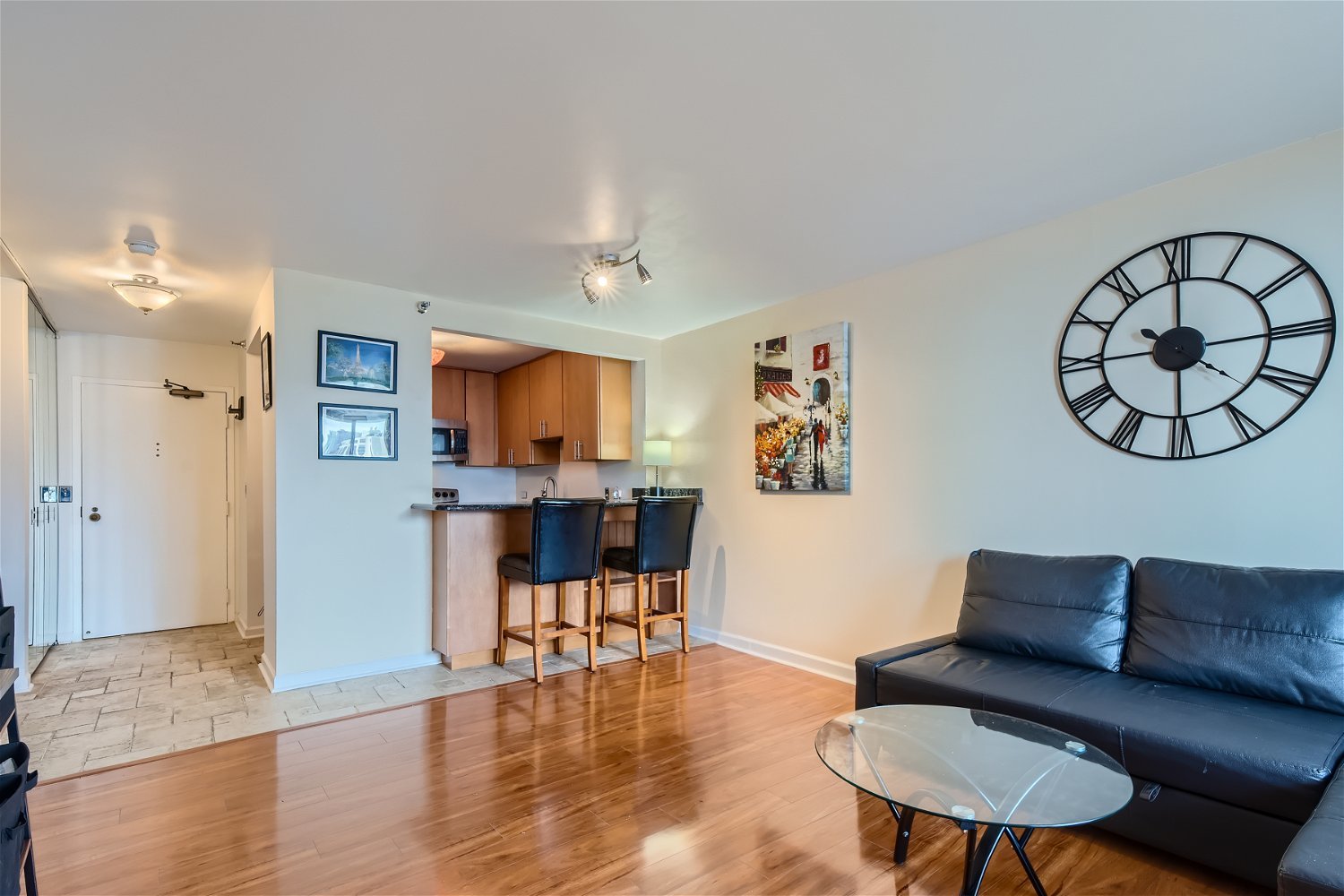 1212 North LaSalle Drive, Unit 1603 Chicago, IL 60610 - Photo 2 of 14 a living room with furniture and a wooden floor