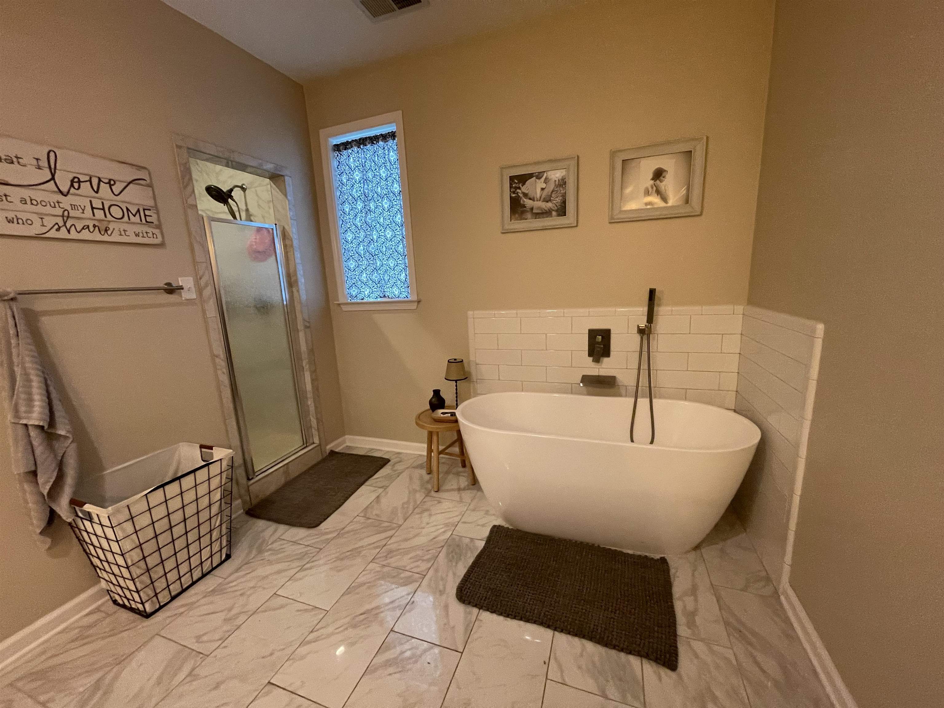 378 Holly Grove Road Covington, TN 38019 - Photo 13 of 23 a bathroom with a sink toilet and mirror