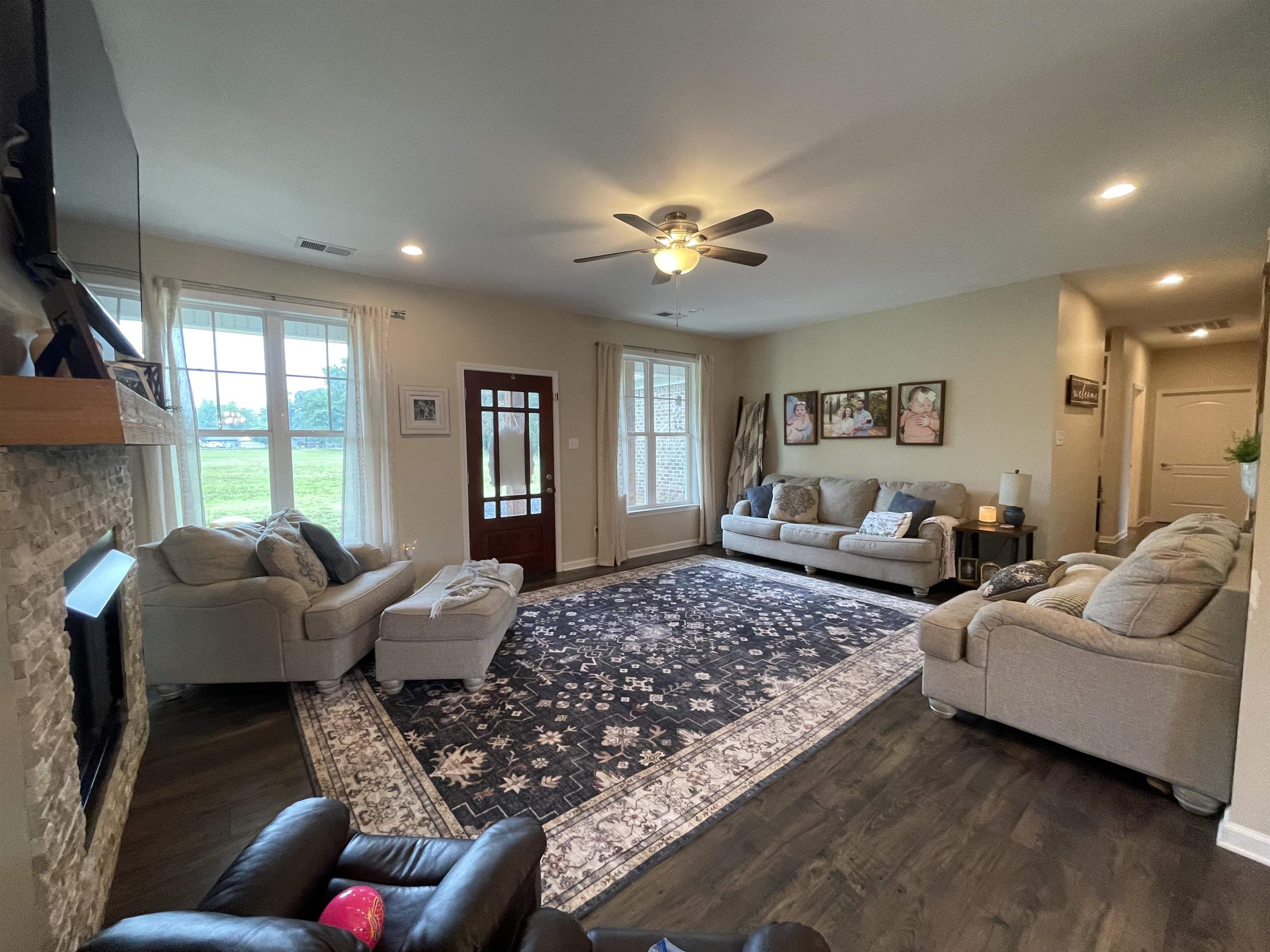 378 Holly Grove Road Covington, TN 38019 - Photo 4 of 23 a living room with furniture ceiling fan and a window