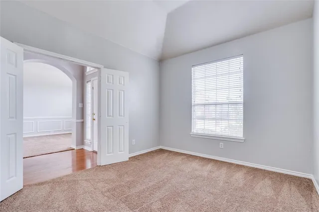 an empty room with windows