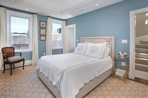 123 Charles Street, Unit 3 Boston, MA 02114 - Photo 8 of 18 a bedroom with a bed a chair and next to a window