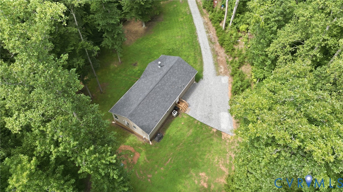 2575 Log Cabin Road Maidens, VA 23102 - Photo 33 of 36 Gable roof with dark shingles, tan siding, and a w