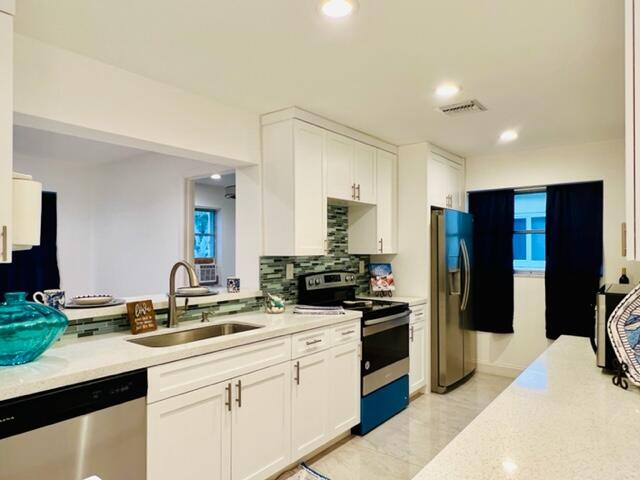 6706 Northwest 57th Court Tamarac, FL 33321 - Photo 1 of 36 KITCHEN