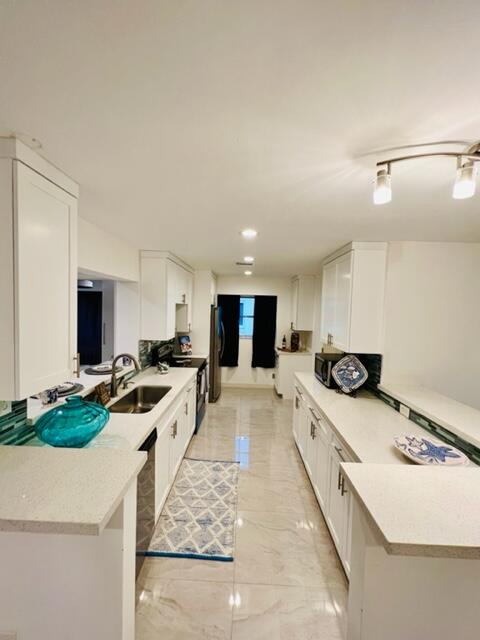 6706 Northwest 57th Court Tamarac, FL 33321 - Photo 2 of 36 LONG VIEW KITCHEN