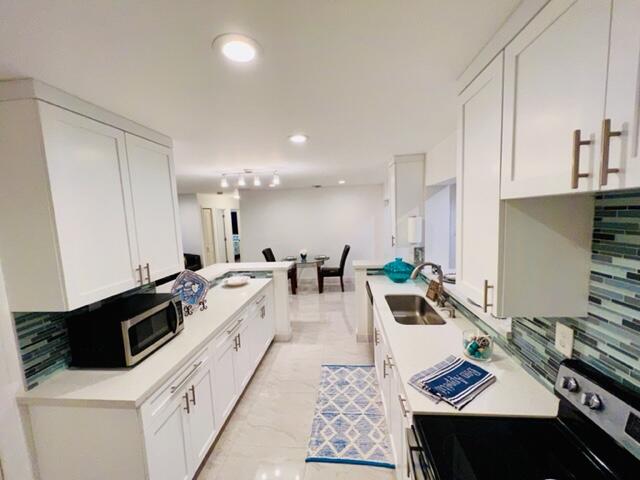 6706 Northwest 57th Court Tamarac, FL 33321 - Photo 3 of 36 5711