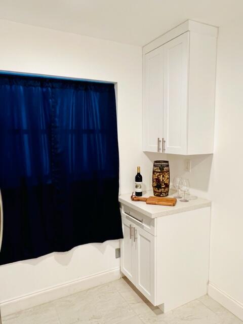 6706 Northwest 57th Court Tamarac, FL 33321 - Photo 7 of 36 WINE STAND