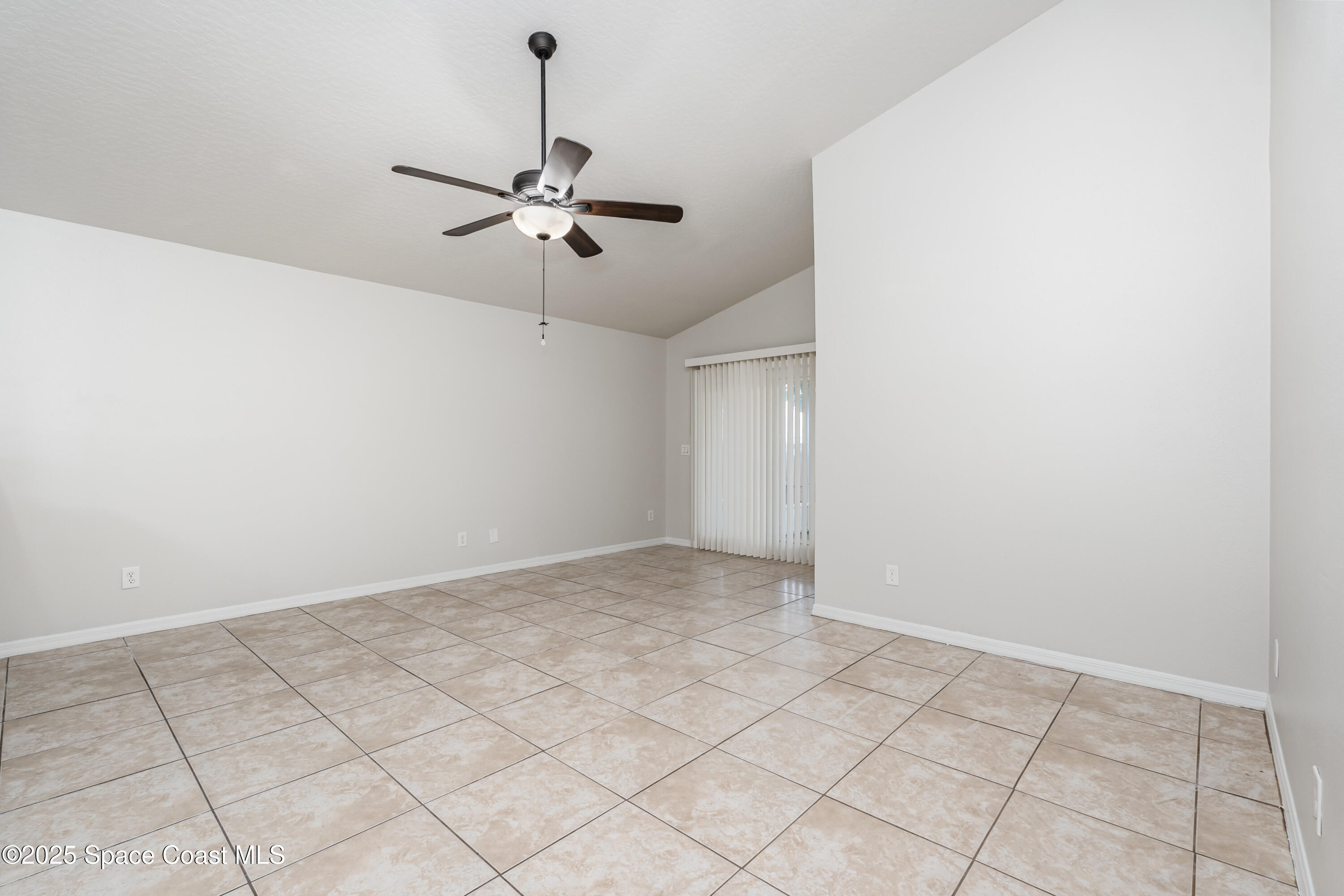 320 Myrtlewood Road Melbourne, FL 32940 - Photo 4 of 18 a view of an empty room