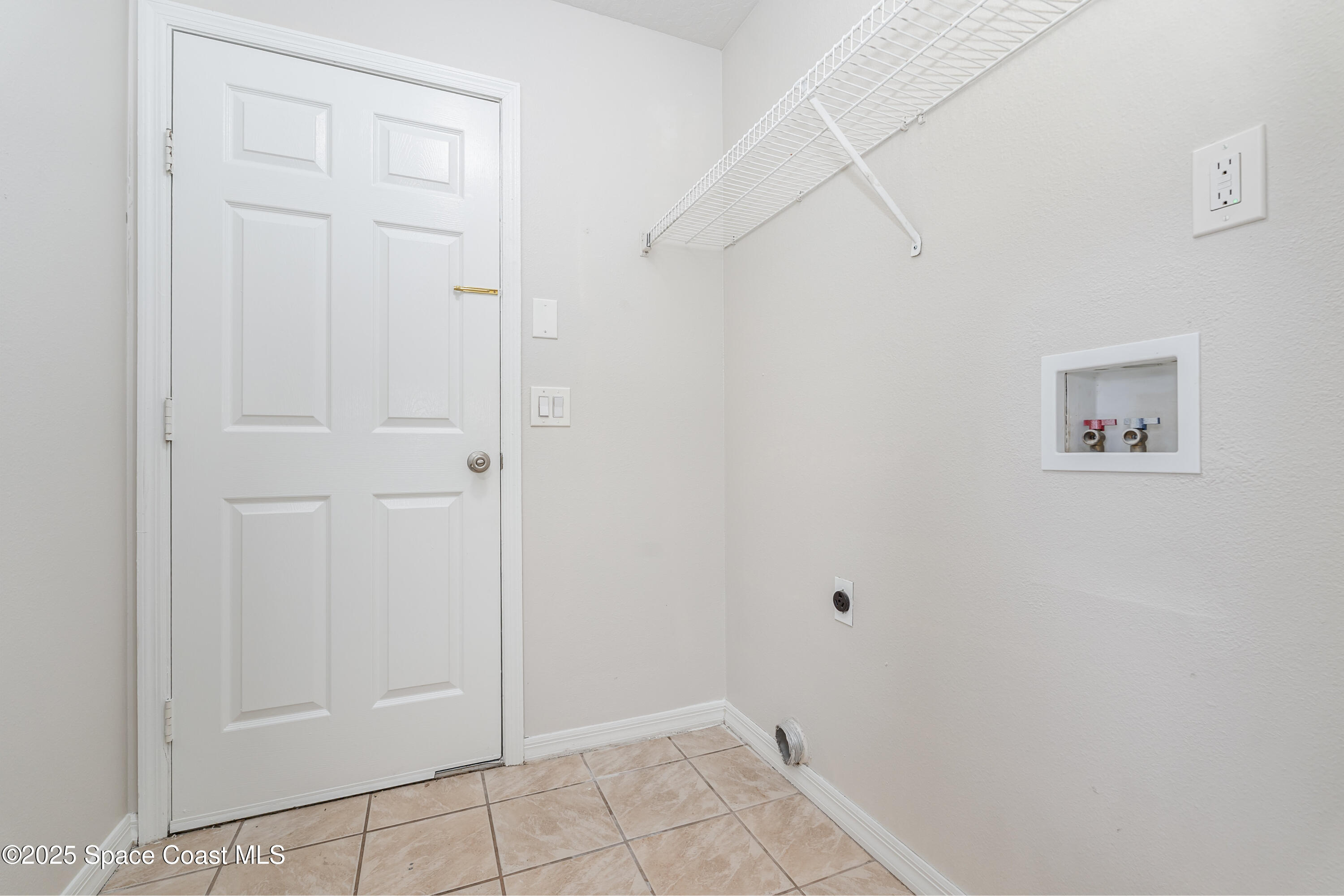 320 Myrtlewood Road Melbourne, FL 32940 - Photo 10 of 18 a view of an empty room