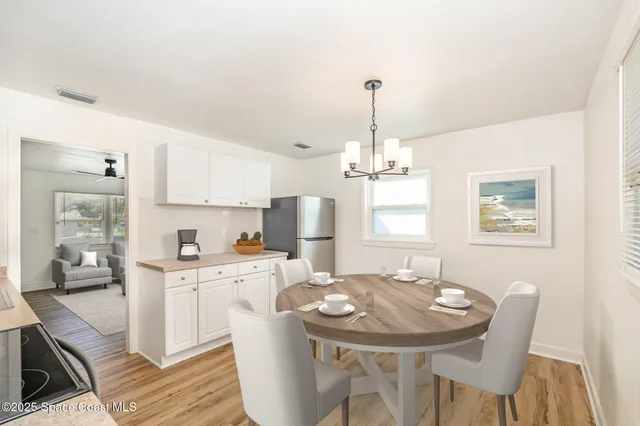 a view of a dining room with furniture