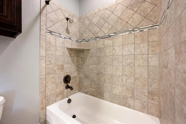 a bathroom with a bathtub
