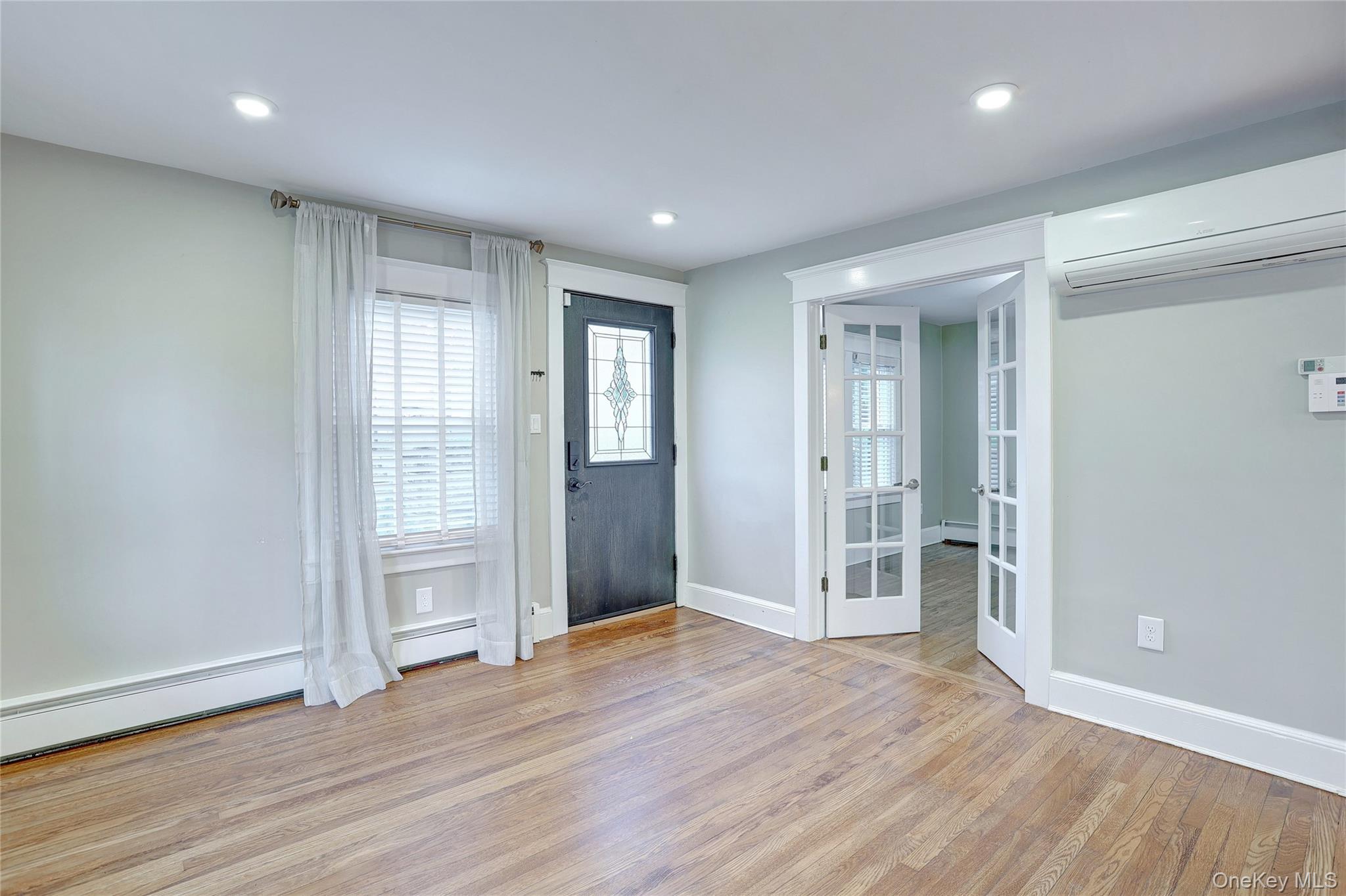 254 North Main Street New City, NY 10956 - Photo 6 of 37 wooden floor in an empty room with wooden floor and windows