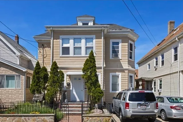 a front view of multiple houses