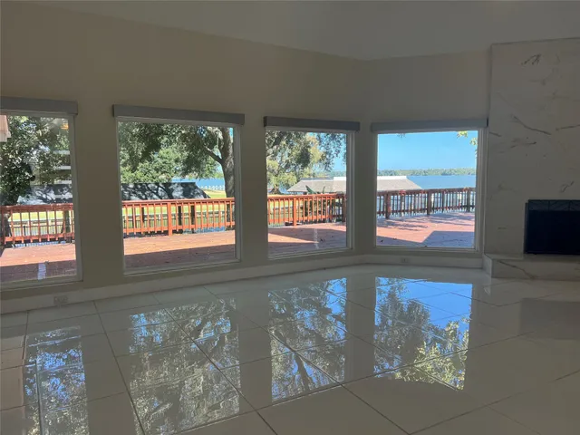 a view of a floor to ceiling window and an outdoor space