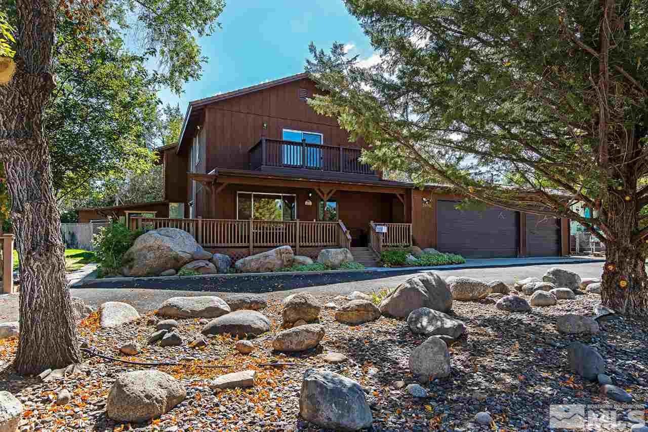 3100 Knight Road Reno, NV 89509 - Photo 1 of 1 a view of a house with a yard siting area and garden