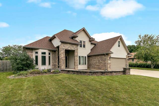 331 Brighton Lane Crete, IL 60417 - Photo 1 of 1 a front view of house with yard and green space