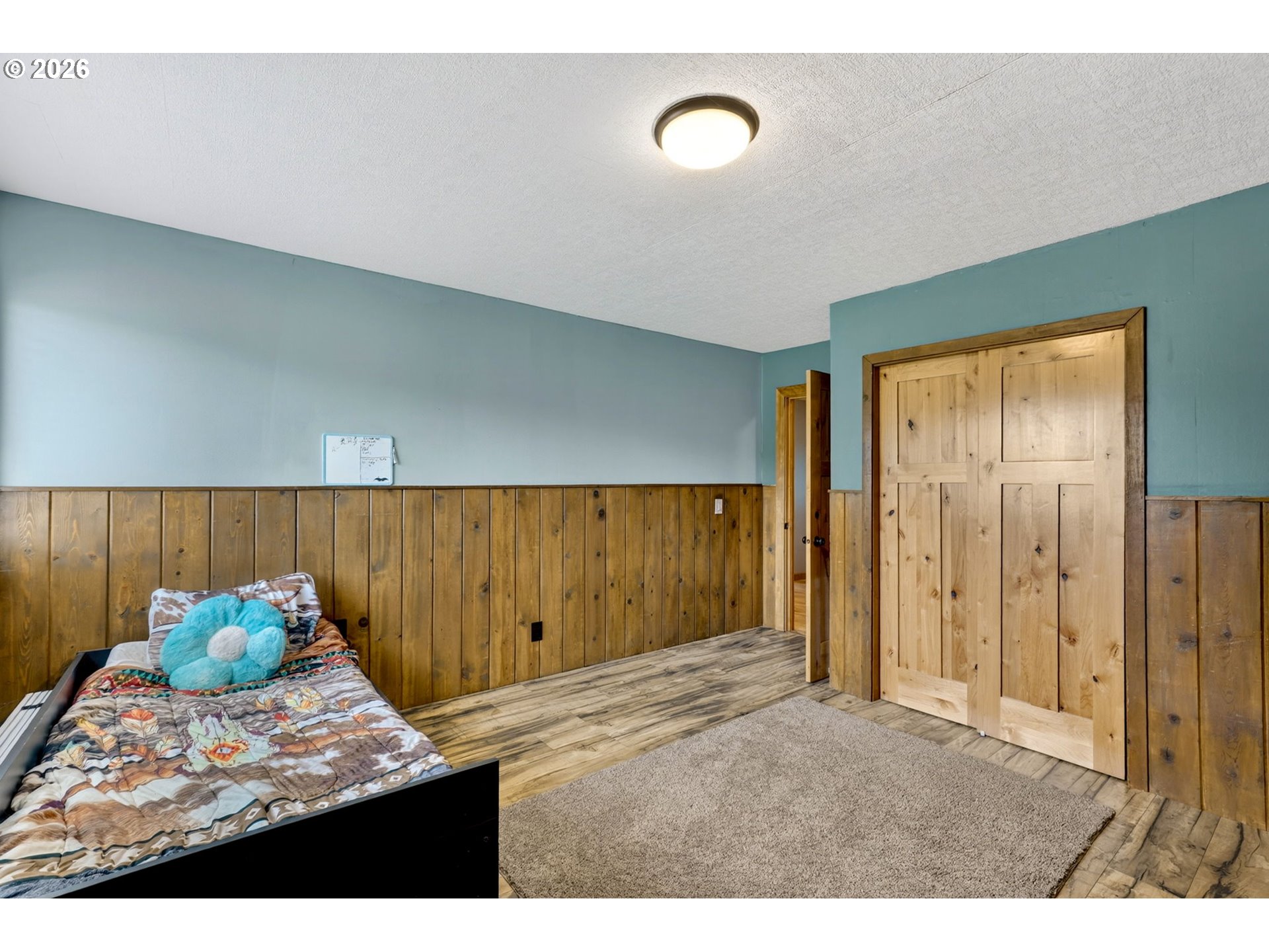 17623 South Windy City Road Mulino, OR 97042 - Photo 12 of 48 a view of a room with wooden floor and cabinet