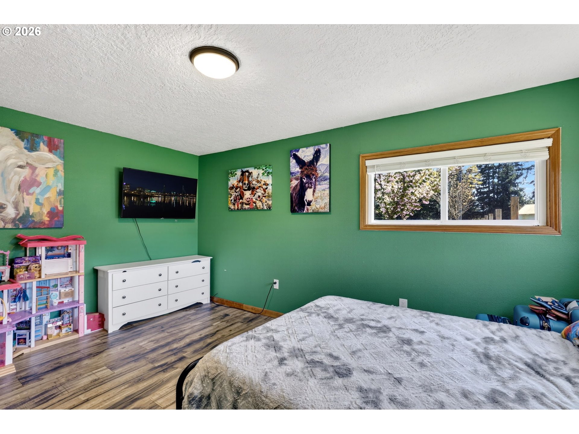 17623 South Windy City Road Mulino, OR 97042 - Photo 14 of 48 a bedroom with a bed and wooden floor