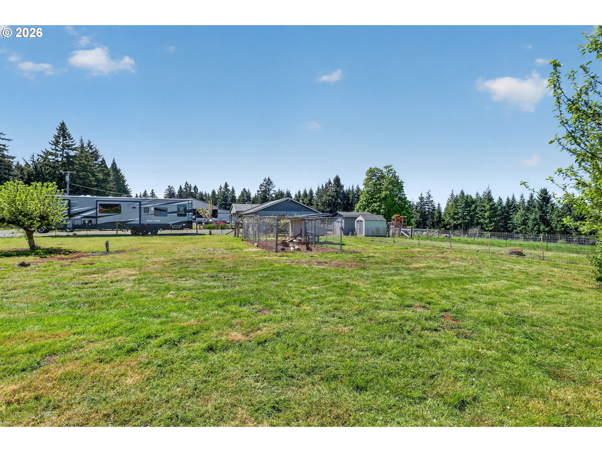 17623 South Windy City Road Mulino, OR 97042 - Photo 41 of 48 a view of a swimming pool with an outdoor seating and a yard