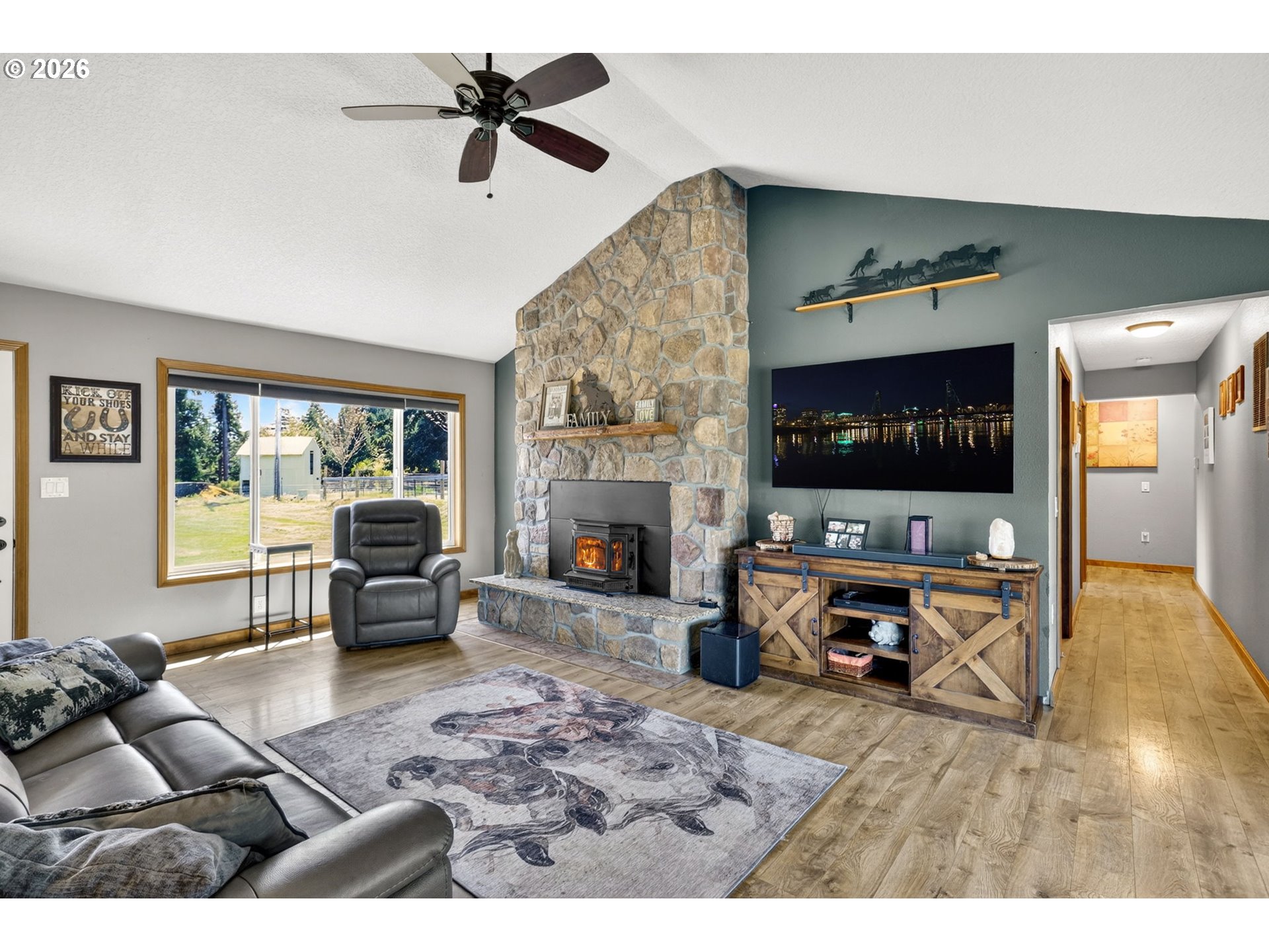 17623 South Windy City Road Mulino, OR 97042 - Photo 7 of 48 a living room with furniture and a fireplace
