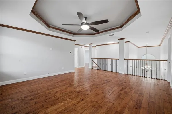 a view of entryway with wooden floor