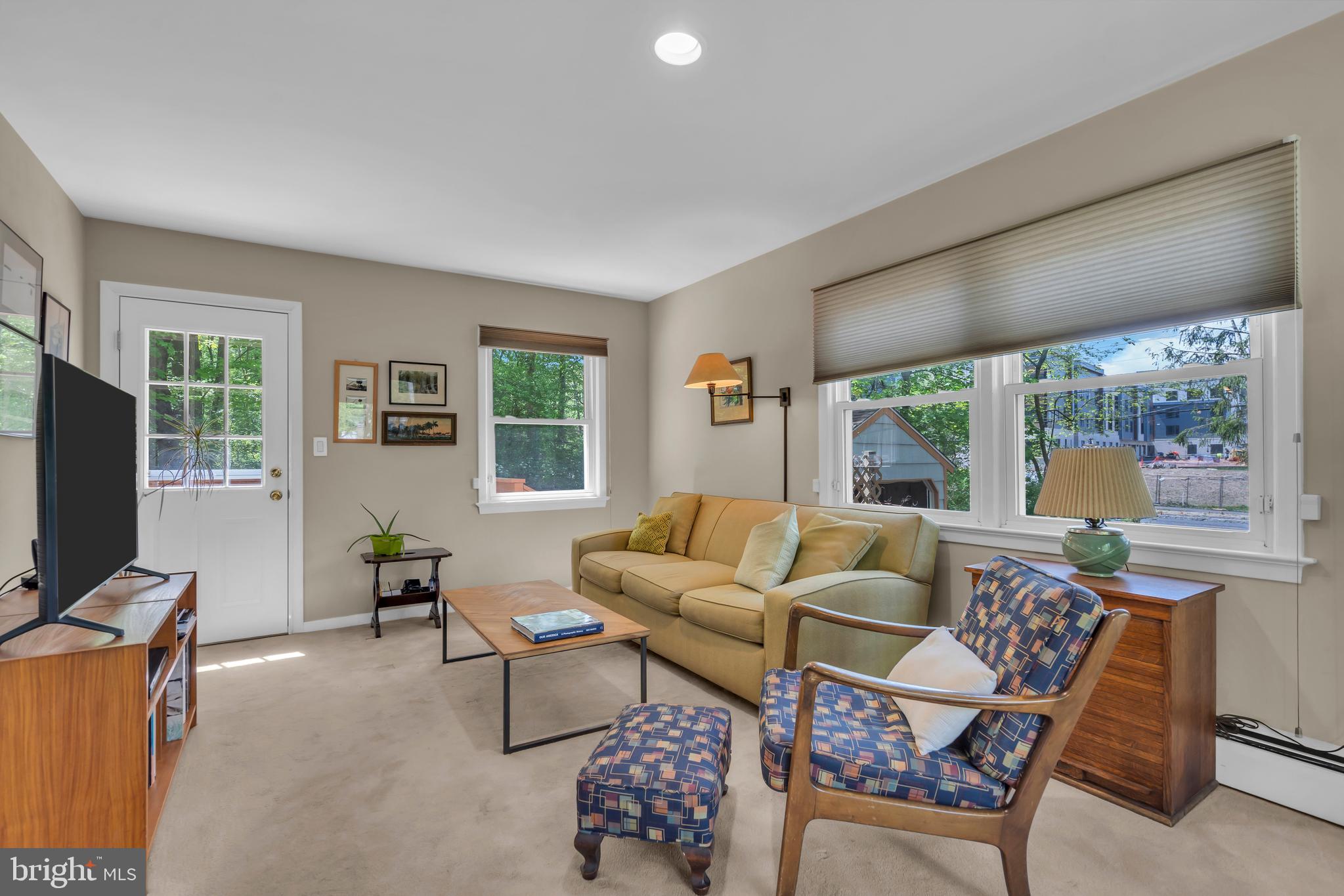 801 Mt Lucas Road Princeton, NJ 08540 - Photo 15 of 39 a living room with furniture and a flat screen tv