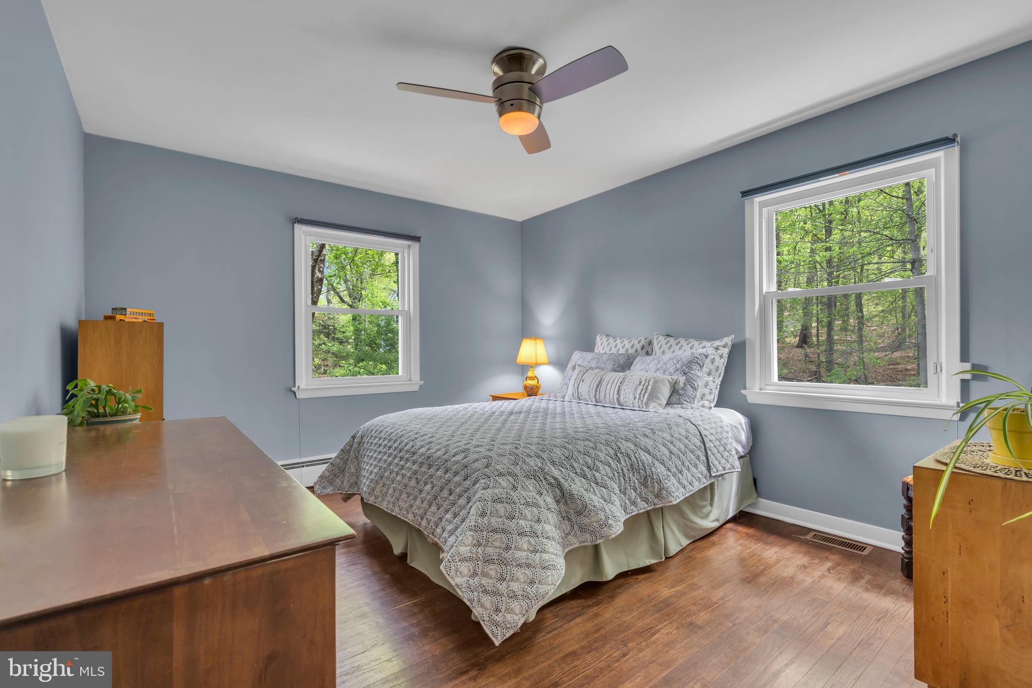 801 Mt Lucas Road Princeton, NJ 08540 - Photo 16 of 39 a bedroom with a bed a window and flowerpot