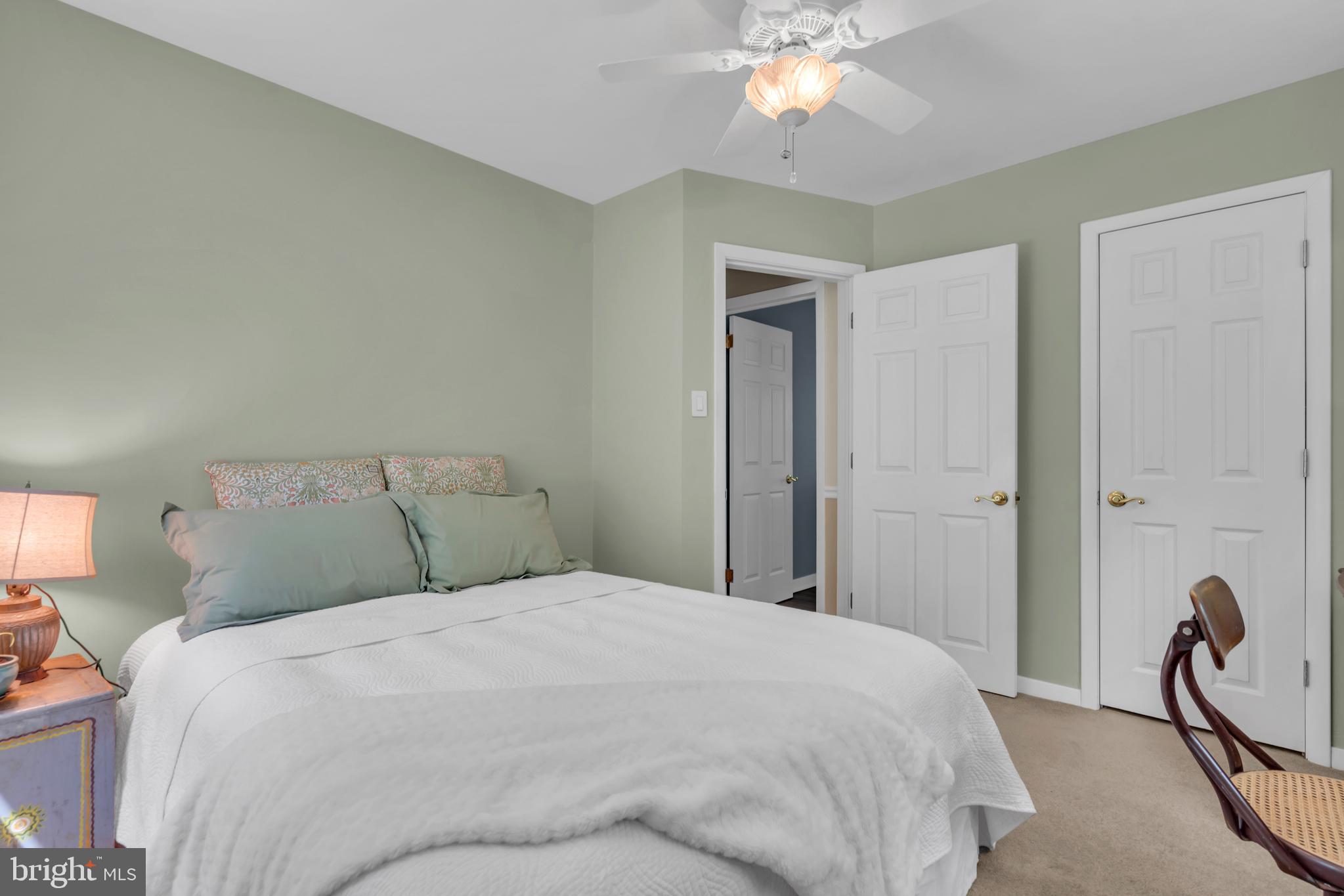 801 Mt Lucas Road Princeton, NJ 08540 - Photo 20 of 39 a bedroom with a bed and a chandelier