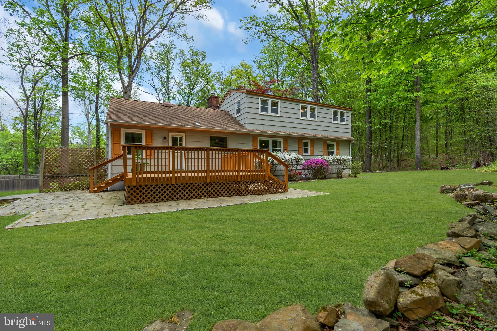 801 Mt Lucas Road Princeton, NJ 08540 - Photo 28 of 39 a front view of a house with a garden and yard
