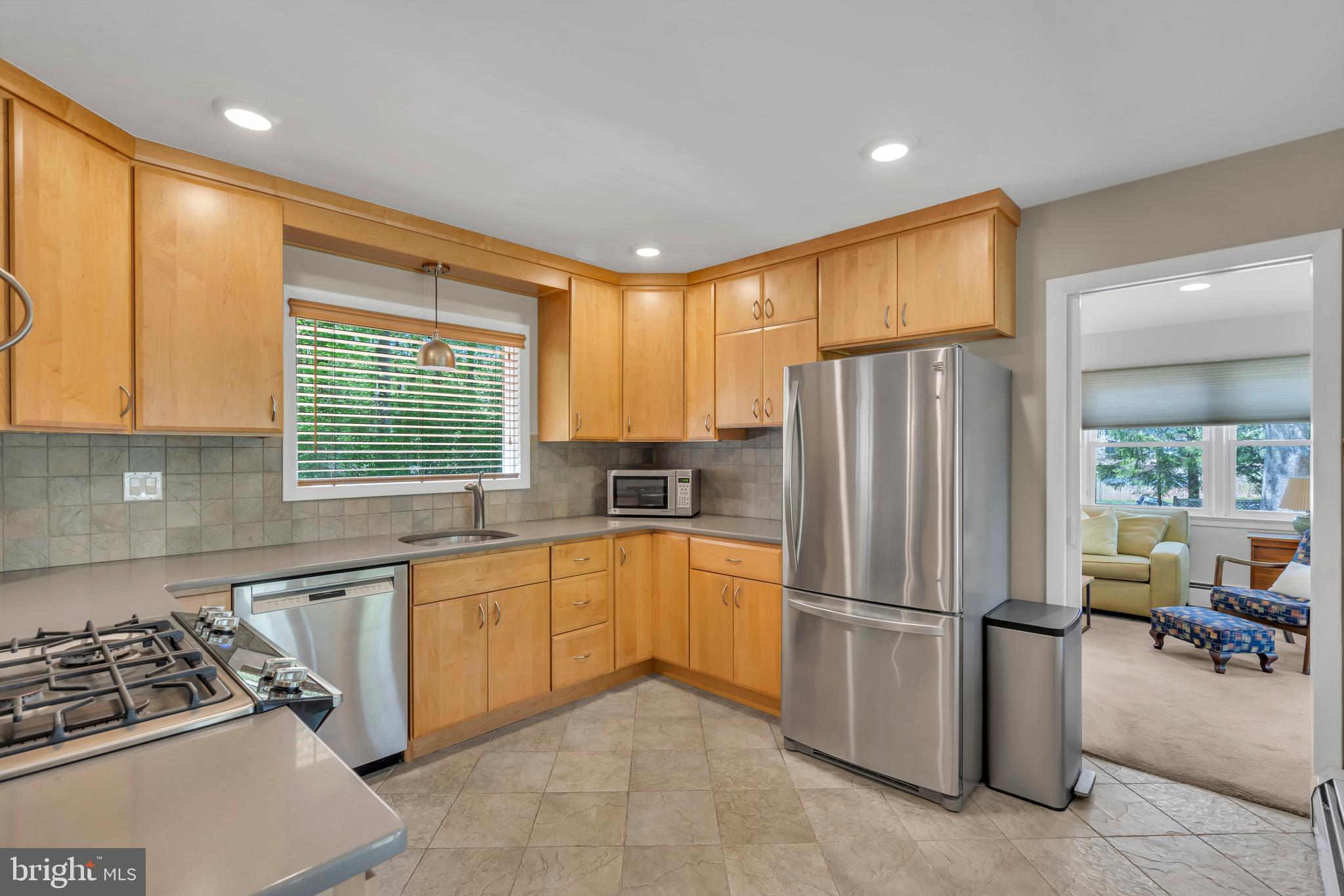 801 Mt Lucas Road Princeton, NJ 08540 - Photo 5 of 39 a kitchen with a refrigerator a sink and a stove top oven