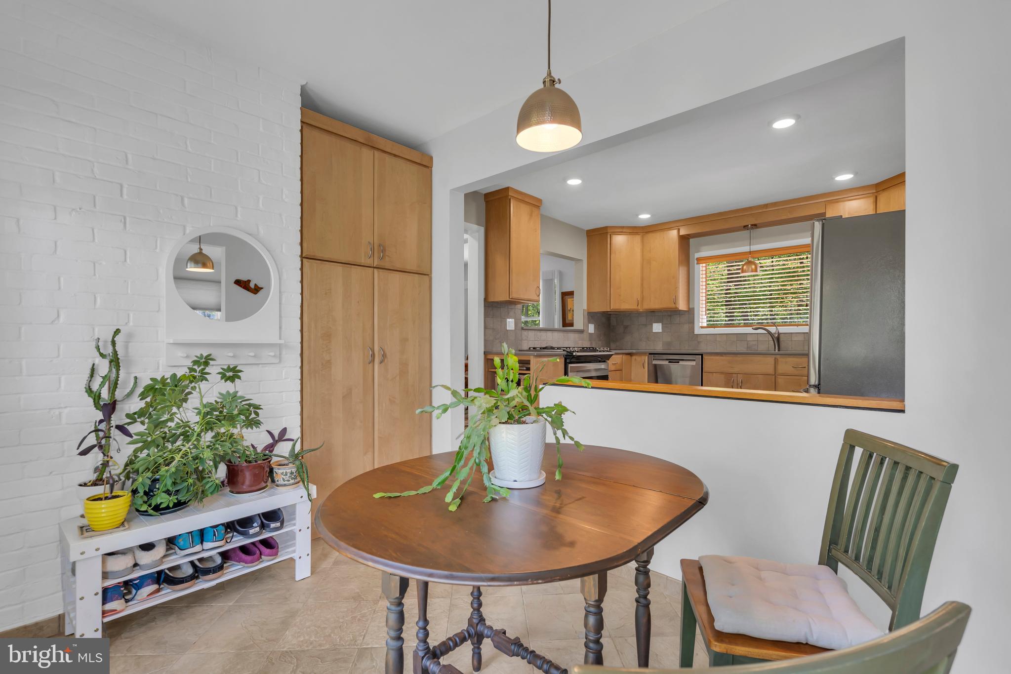 801 Mt Lucas Road Princeton, NJ 08540 - Photo 7 of 39 a dining room with furniture and a potted plant