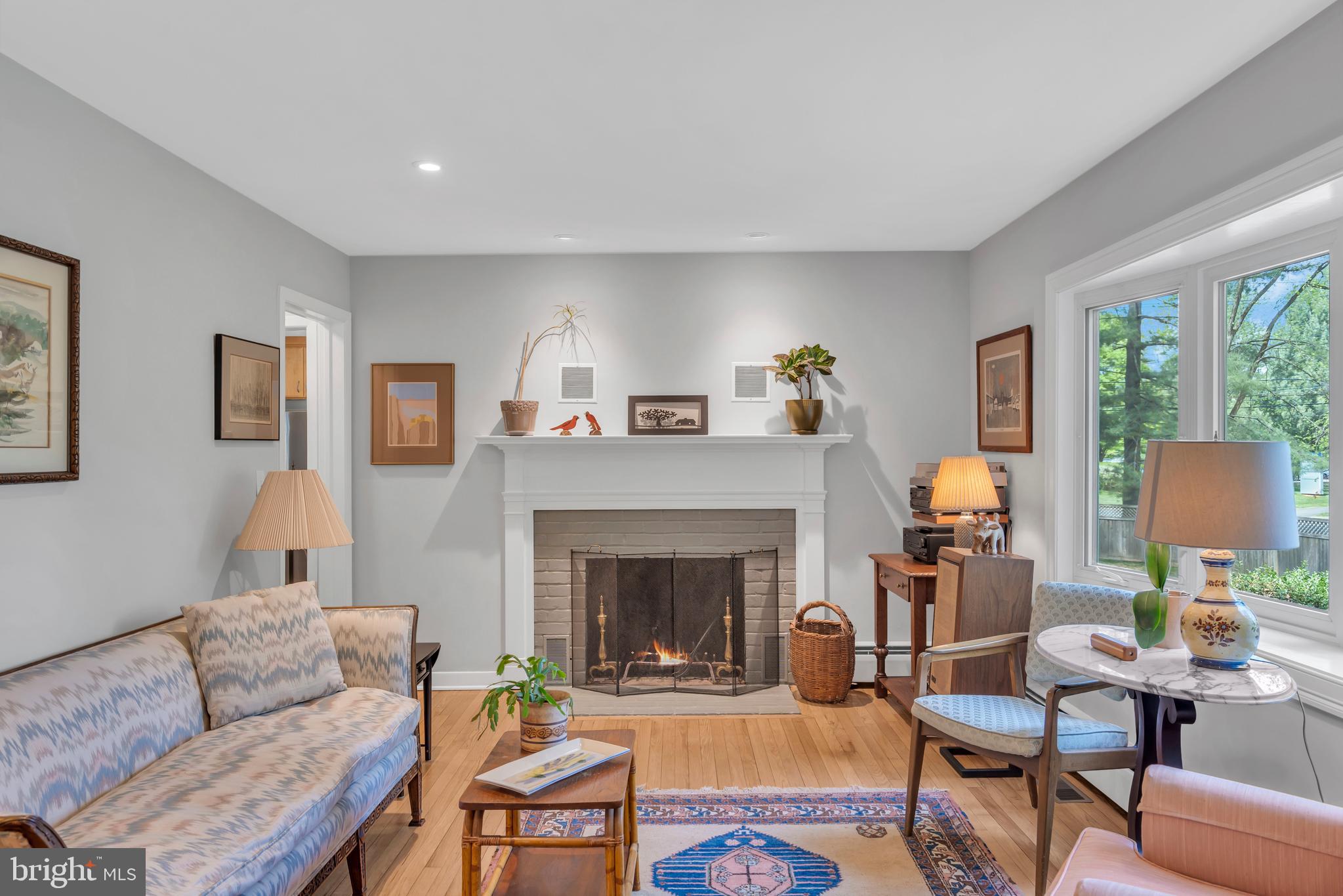 801 Mt Lucas Road Princeton, NJ 08540 - Photo 10 of 39 a living room with furniture and a fireplace