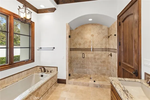 a view of a house with backyard porch and sitting area