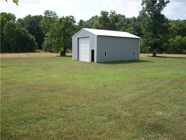 283 John Sugg Road Fayetteville, TN 37334 - Photo 3 of 16 26x30 shop w/ electric, roll ups doors on each end.