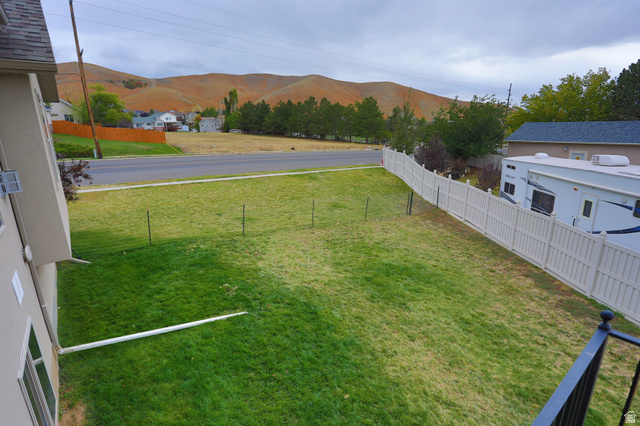 426 Deer Hollow Road Tooele, UT 84074 - Photo 37 of 37 View of yard featuring a mountain view