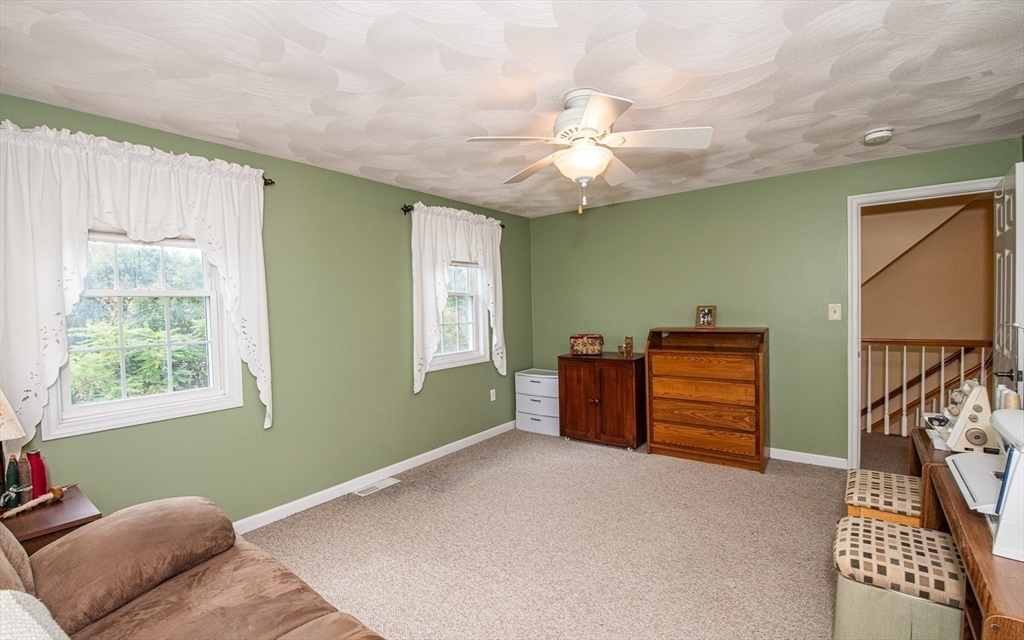 6 Innisfree Drive Haverhill, MA 01832 - Photo 23 of 41 a bedroom with furniture and a window