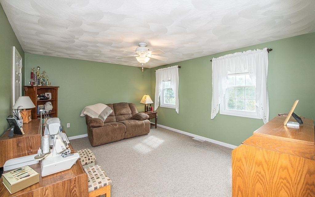 6 Innisfree Drive Haverhill, MA 01832 - Photo 24 of 41 a living room with furniture and a window