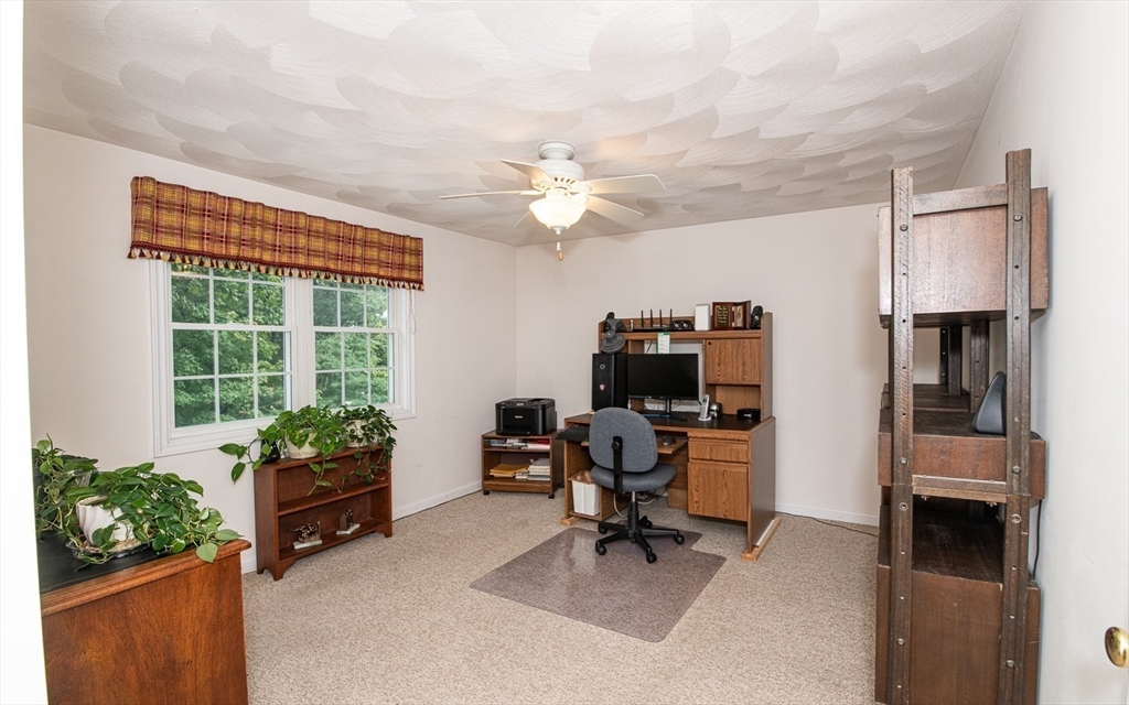 6 Innisfree Drive Haverhill, MA 01832 - Photo 26 of 41 a view of a workspace with furniture and a window
