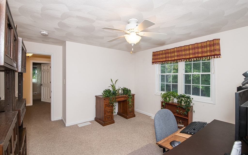 6 Innisfree Drive Haverhill, MA 01832 - Photo 27 of 41 a workspace with furniture and a potted plant