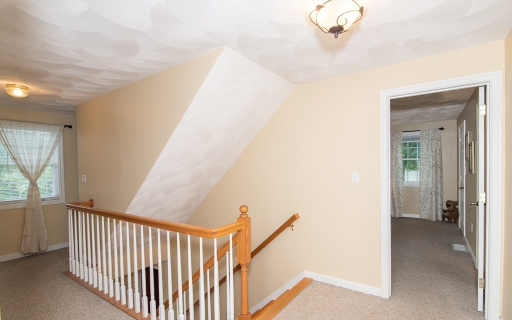 6 Innisfree Drive Haverhill, MA 01832 - Photo 29 of 41 a view of a hallway view with staircase