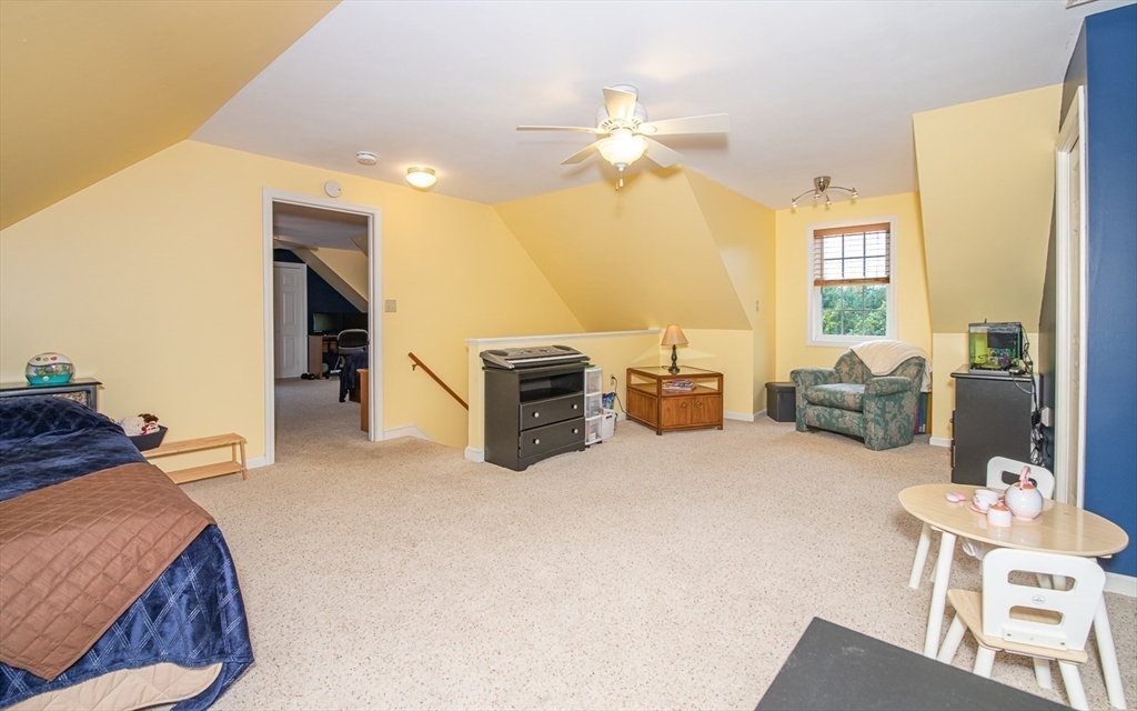 6 Innisfree Drive Haverhill, MA 01832 - Photo 30 of 41 a bed room with a bed and furniture